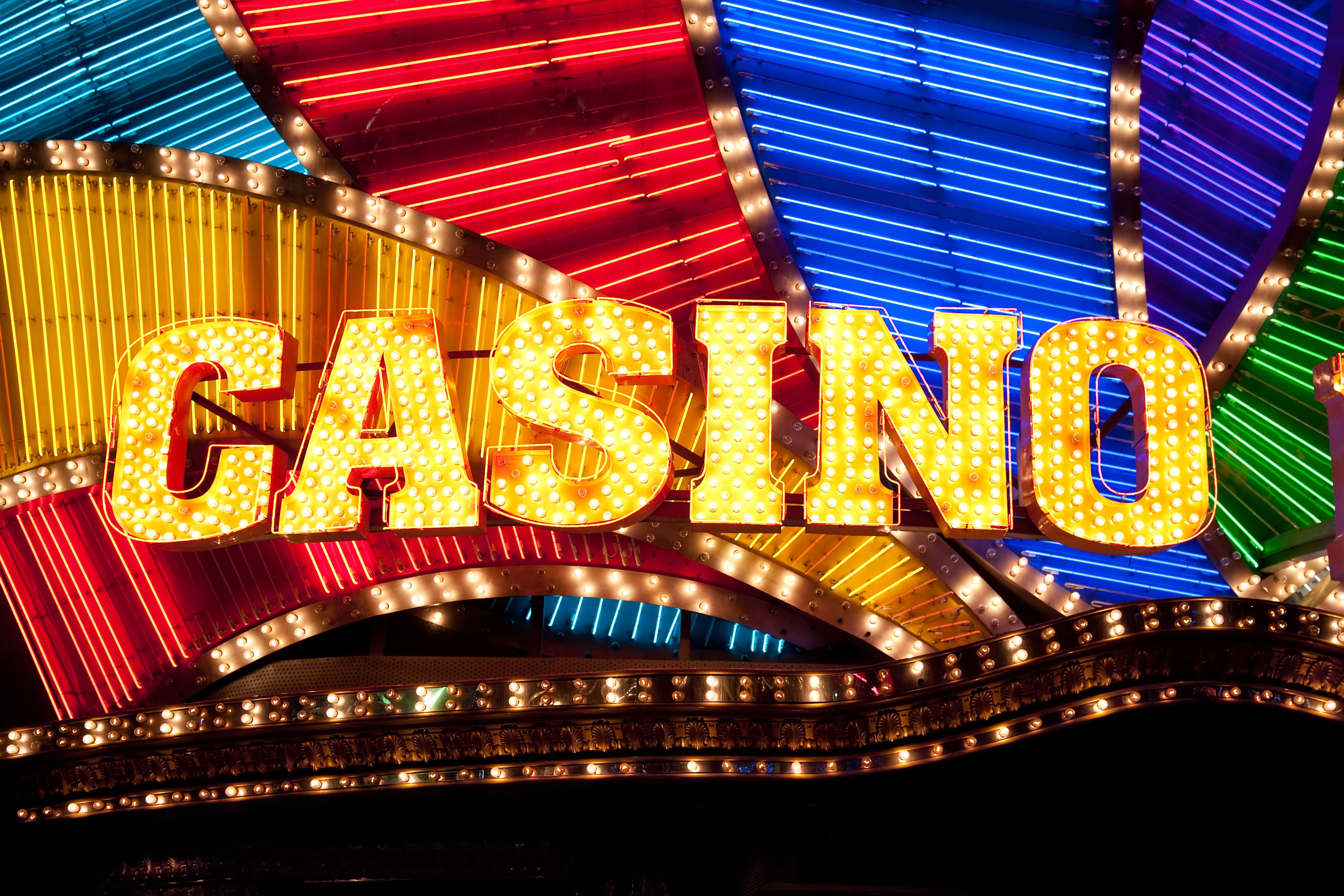 A stylish graphic with the Miami Club Casino logo and its art-deco theme.